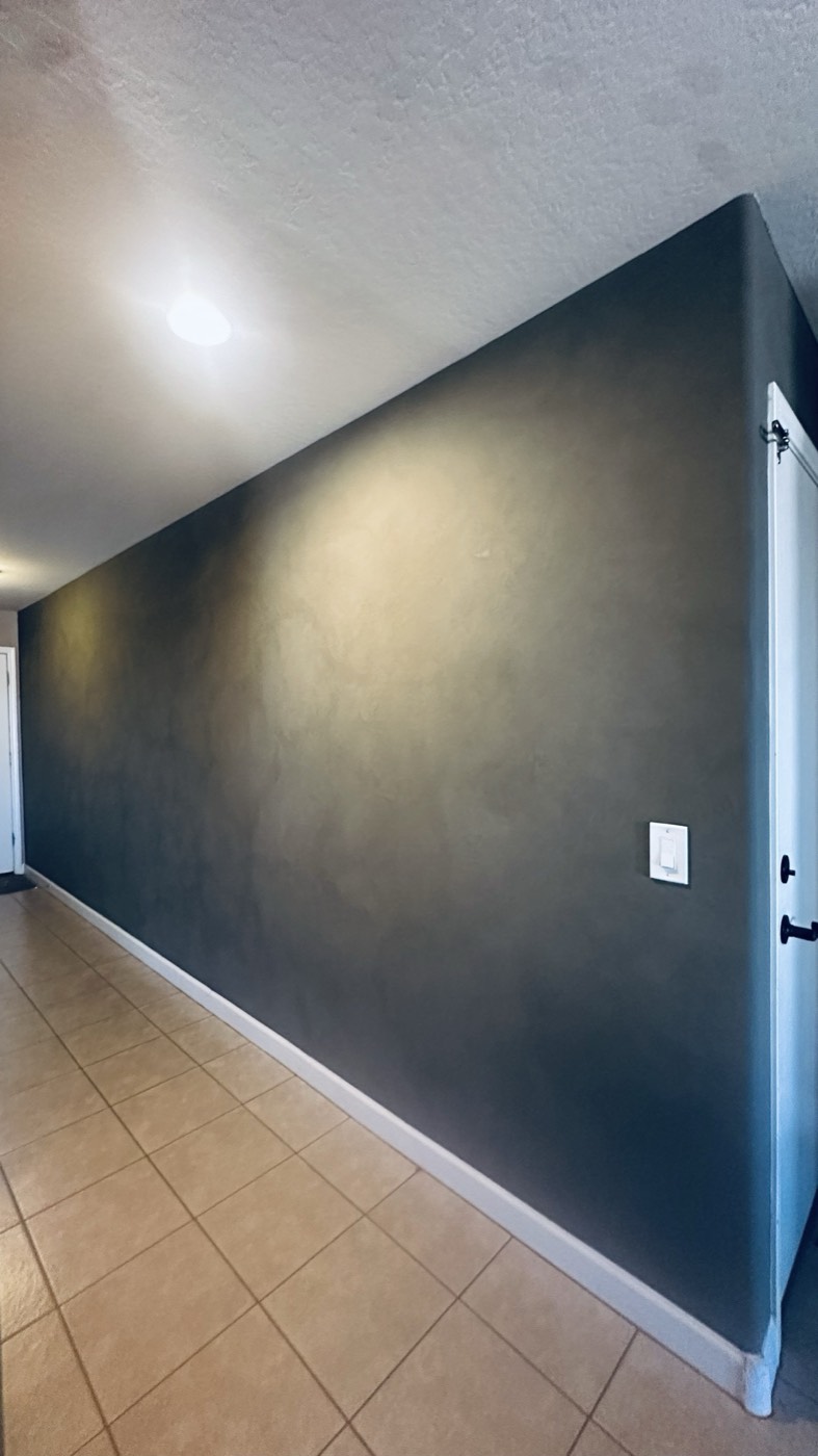 Charcoal limewash hallway accent wall with deep cloud depth, Phoenix