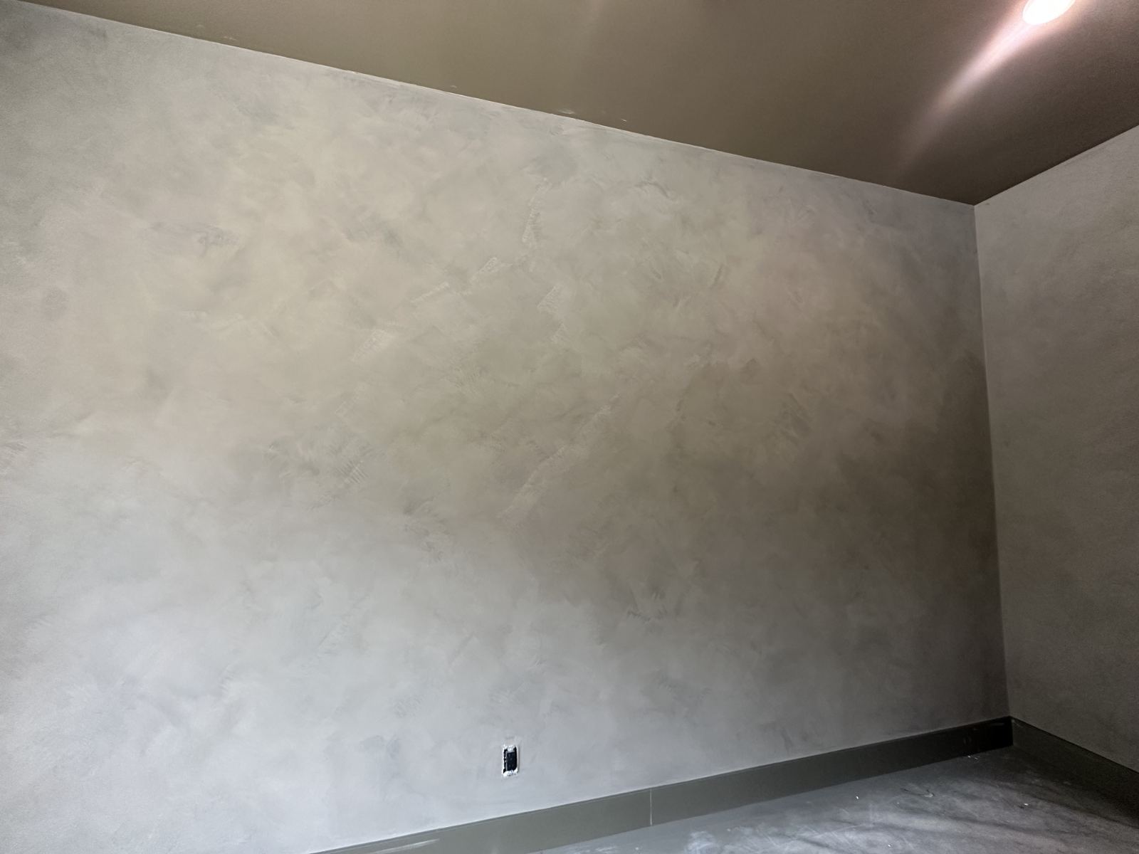 Interior limewash painting on a living room accent wall in Phoenix, AZ